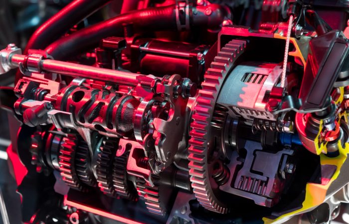 From above of automotive industrial part of modern motorbike red engine room